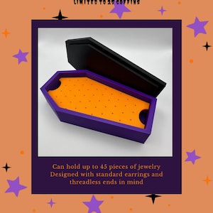 May include: A coffin-shaped jewelry organizer with a purple exterior and a bright orange interior foam insert featuring numerous small holes for storage. The black lid is propped open. Text reads: REST IN PIERCINGS, LIMITED TO 25 COFFINS, Can hold up to 45 pieces of jewelry, Designed with standard earrings and threadless ends in mind, @AURIC.HOLES BY @JORDANIC.HOLES.