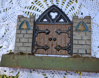 Polychrome bookends - wooden gate doors in a stone wall, (set of 2)