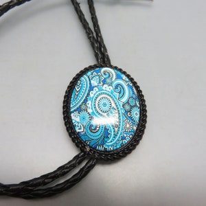 Vintage Glass Blue Paisley Bolo Tie,  Handmade, Blue, and White Pattern Background