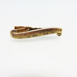 ヴィンテージ ストックティッカー タイクリップ：1960年代の刻印入りゴールド留め金