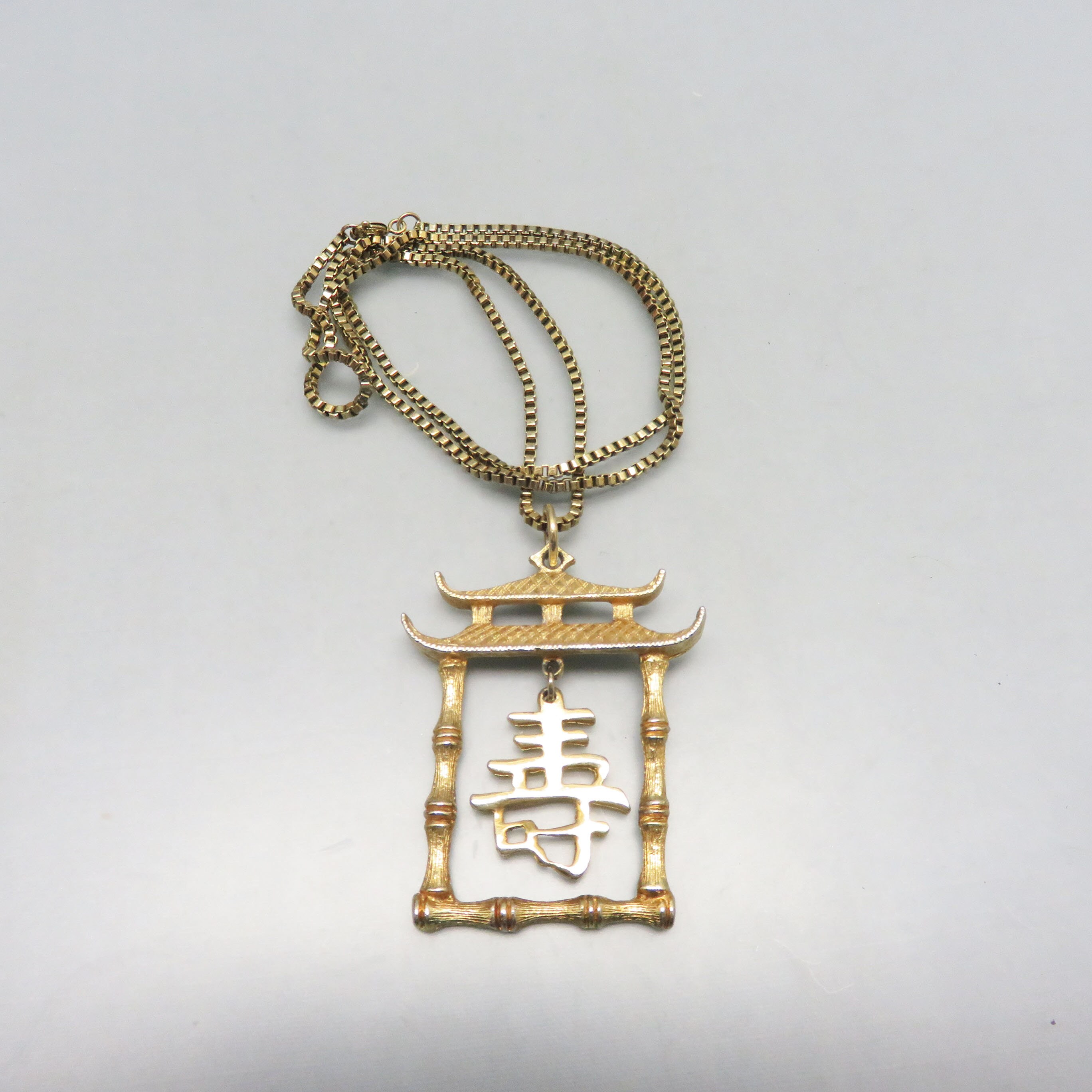 Pagoda name necklace deals