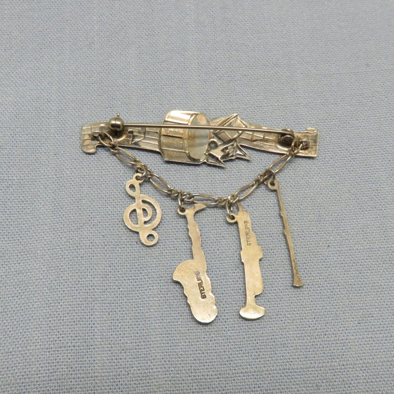 1970s Sterling Silver Band and Musical Instruments Pin