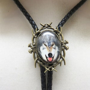 Gray Wolf Bolo Tie: Glass Picture, Golden Antler Frame, 36&quot; Leather Cord