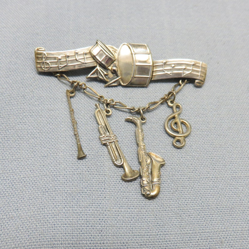 1970s Sterling Silver Band and Musical Instruments Pin