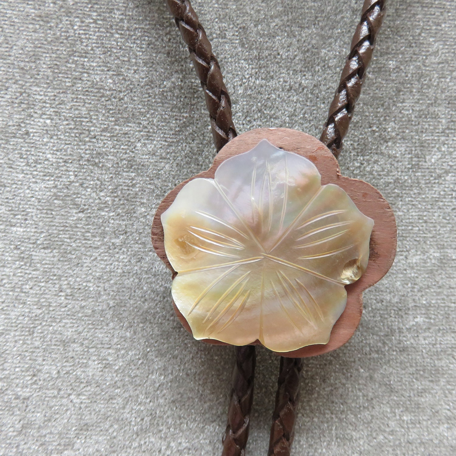 Carved Creamy White Mother of Pearl Flower Bolo Tie, Warm Wood Back,