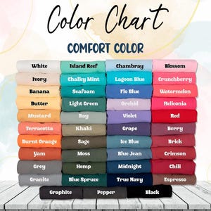May include: A color chart displaying a variety of Comfort Color fabric swatches. The chart includes colors such as white, ivory, banana, mustard, terracotta, yam, grey, granite, island reef, chalky mint, chambray, blossom, lagoon blue, crunchberry, seafoam, flo blue, watermelon, light green, orchid, heliconia, bay, violet, red, khaki, grape, berry, sage, ice blue, brick, moss, blue jean, crimson, hemp, midnight, chili, blue spruce, true navy, espresso, graphite, pepper, and black.