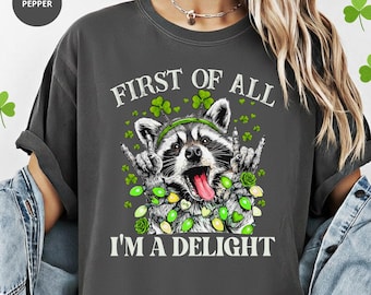 First Of All Im A Delight Shirt, Funny St Patricks Day Raccoon Tee, Sassy Shamrock Irish Green Shirt For Women, March 17 Top