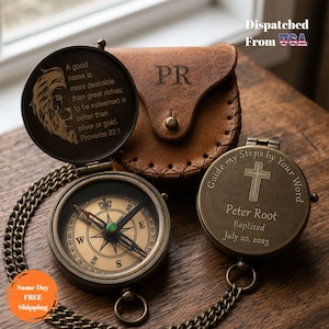 May include: A brass pocket compass with a chain, featuring an open lid engraved with a lion and the text A good name is more desirable than great riches; to be esteemed is better than silver or gold. Proverbs 22:1. A leather pouch with PR is included.