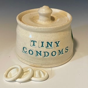 Tiny condoms jar to hold your finger cots, or tiny condoms.