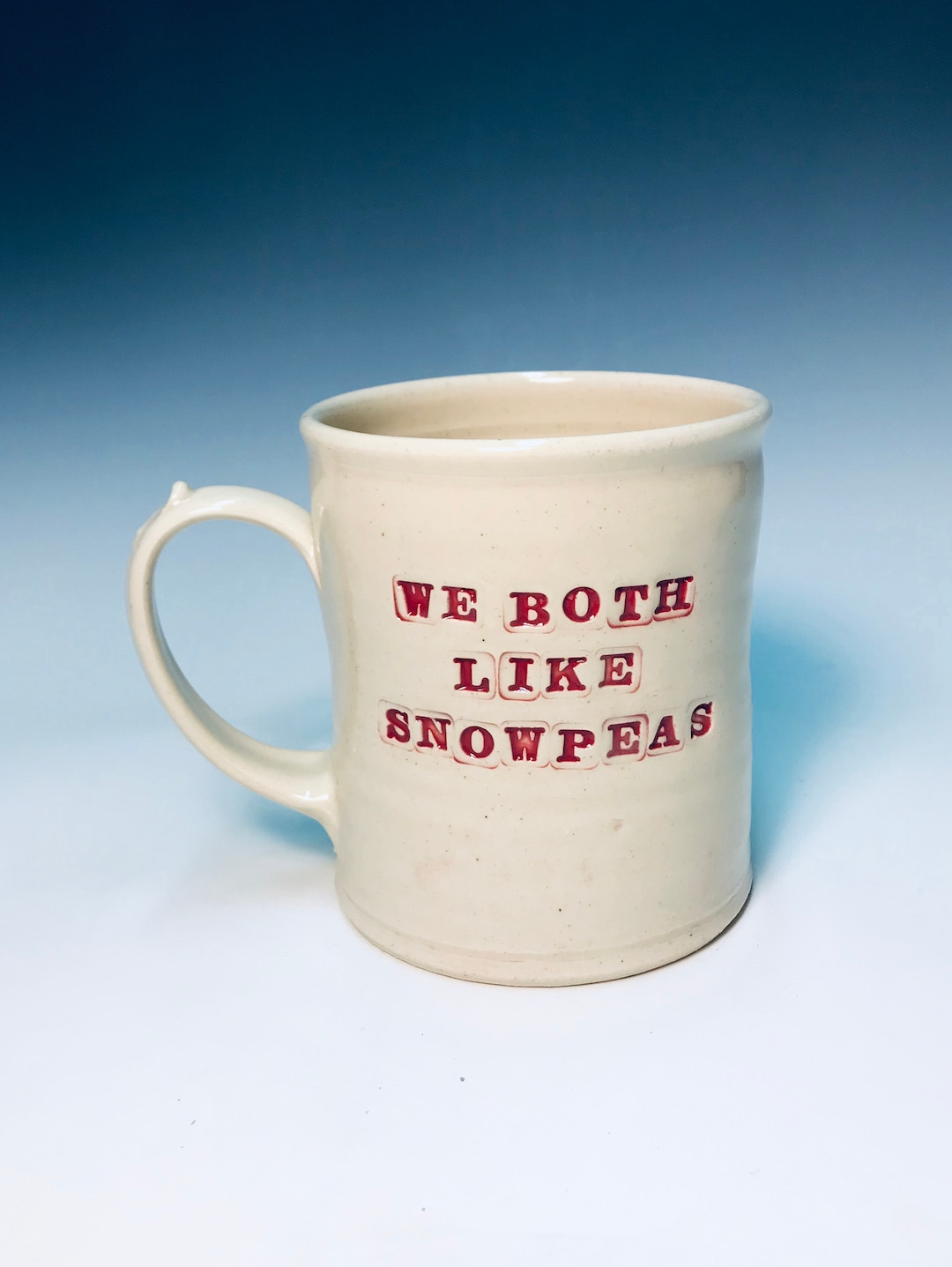16oz we both like snow peas mug