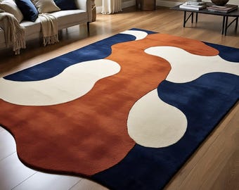 Alfombra abstracta de lana, azul marino, naranja y crema, tejida a mano, estilo moderno de mediados de siglo.
