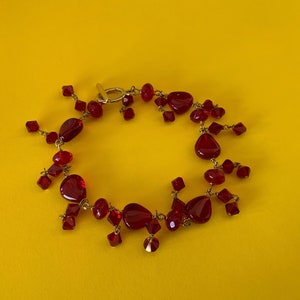Bright Clear Red Faceted and Smooth Wire Strung Glass Bead Bracelet