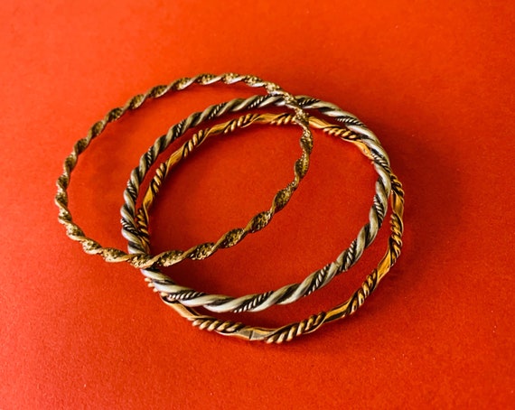 Three Compatible Twisted Silver and Gold Bangles - image 2