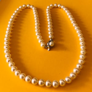 Glossy Creamy White Faux Pearl Necklace With Decorative Rhinestone and Silver Tone  Metal Clasp