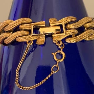 Monet Decoritive Textured Gold Tone Chain Bracelet With Safety Chain