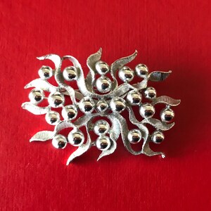 Elegant Dotted Burst Abstract Silver Textured Brooch