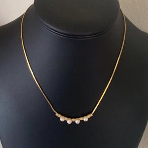 Lovely 16 inch Chain Necklace With Clear Rhinestone and Faux Pearl Focus and Tiny Rhinestones On Both Sides of the Clasp