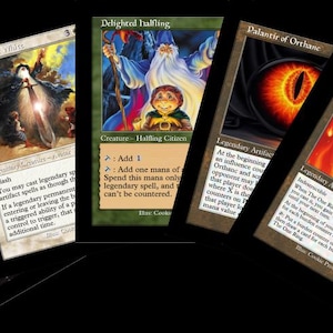 May include: A collection of Magic: The Gathering cards featuring fantasy art. The cards include "Orcish Bowmasters", "Delighted Halfling", "Palantir of Orthanc", and "The One Ring". The cards are displayed against a black background.