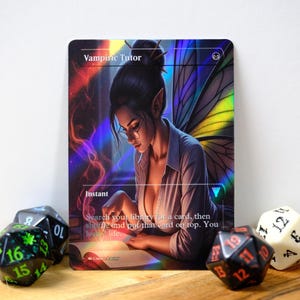 May include: A fantasy card titled "Vampiric Tutor" featuring a woman with fairy wings, reading a book. The card has a holographic design with text that reads "Instant" and instructions. Dice with various numbers are scattered around the card.