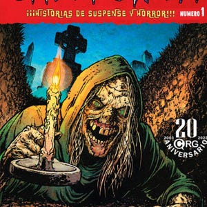 以下が含まれることがあります： 「Creepshow」のコミック表紙。不気味な姿がろうそくを持っています。背景は墓地。タイトル「Creepshow」は赤色の背景に白い文字で表示されています。ナンバー1と20周年記念。