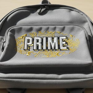 May include: Gray backpack with a front pocket featuring the word "PRIME" in white, outlined in gold, with a gold decorative design. The backpack has a top handle and adjustable straps.