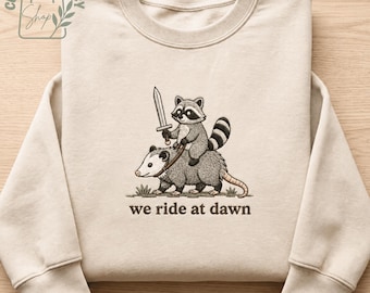 We Ride At Dawn Raccoon Embroidered Sweatshirt, Funny Opossum Shirt, Ren Faire Cottagecore Animal Hoodie