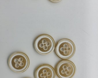 8 White and Tan Buttons