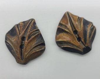 2 Carved Wooden Buttons