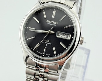 Vintage Seiko 5 Automatikuhr: Schwarzes DX-Zifferblatt, Edelstahl-Herrenarmbanduhr