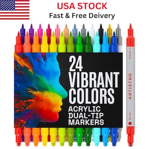 May include: A set of 24 dual-tip acrylic markers in vibrant colors. The markers are arranged in a row, with a black box displaying the text "24 VIBRANT COLORS" and "ACRYLIC DUAL-TIP MARKERS". The brand name "ARTISTRO" is visible on a single marker.