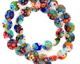 May include: A strand of colorful glass beads with a floral pattern. The beads are round and have a translucent appearance.