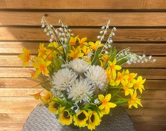 Bloemen gedenkteken grafarrangementen