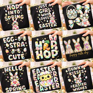 May include: Black t-shirts with Easter-themed designs. The shirts feature colorful graphics of bunnies, eggs, bows, and text like "Hop into Spring," "Just a Girl Who Loves Easter," and "Happy Easter Day."