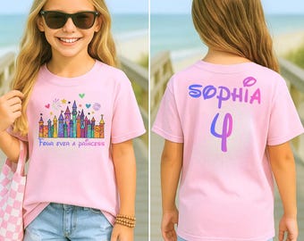 May include: A pink t-shirt with a colorful castle graphic and the text "Four ever a princess" on the front. The back of the shirt has the name "Sophia" and the number "4" printed in a gradient color scheme.