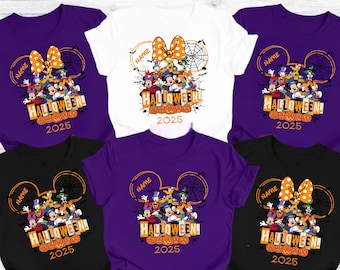 May include: A collection of Halloween-themed t-shirts in various colors, including purple, black, and white. Each shirt features a graphic of Disney characters, a bow, spiderwebs, and the text "HALLOWEEN! 2025" with a space for a name.