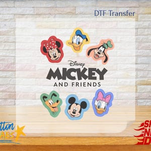 May include: DTF transfer featuring Disney's Mickey and Friends. The design includes images of Mickey Mouse, Minnie Mouse, Donald Duck, Daisy Duck, Goofy, and Pluto. The text "Mickey and Friends" is also included.