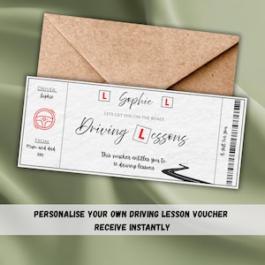 May include: A personalized driving lesson voucher with the name "Sophie" and a road graphic. The voucher is white with black text and a red steering wheel icon. It is accompanied by a brown envelope.
