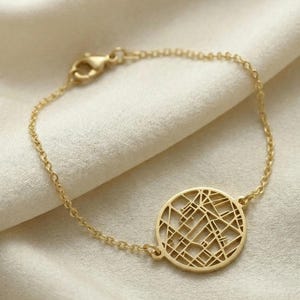 May include: A set of three ceramic mugs with a speckled, matte finish. Each mug features a different color: light blue, cream, and gray. The mugs have a simple, modern design and a comfortable handle.