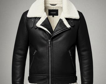 May include: Black leather jacket with a white shearling collar and lining. The jacket features a zip-up front, two side pockets, and a buckled waist belt. The jacket has a classic aviator style.