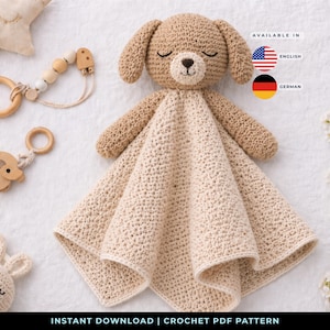 May include: A crocheted dog security blanket in beige with closed eyes, a brown nose, and floppy ears. The blanket is surrounded by a wooden teether, a wooden elephant rattle, and a crocheted bunny. Text reads "INSTANT DOWNLOAD | CROCHET PDF PATTERN".