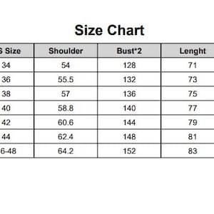 May include: A white size chart with black text. The chart includes measurements for size, US size, shoulder, bust, length, and sleeve. Sizes range from XS to XXXL, with measurements in inches.