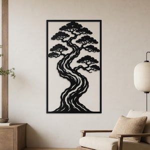May include: Black metal wall art featuring a stylized bonsai tree silhouette. The artwork is set against a cream-colored background within a black rectangular frame. The tree's branches and trunk have a flowing, organic design, suitable for home decor.