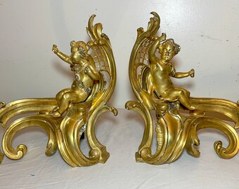 Pair 1800's ornate dore bronze figural fireplace andirons cherub putti chenets