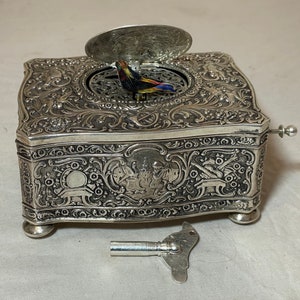 rare antique ornate sterling silver German singing bird mechanical music box
