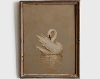 May include: An oil painting in a wooden frame depicting a white swan with textured brushstrokes. The swan is positioned in the centre against a muted, earthy beige background, with its reflection visible in the water below the bird's body.