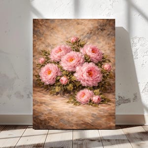 May include: A canvas print featuring a floral still life. The artwork showcases a bouquet of pink peonies with yellow centers and green leaves against a textured brown background. The painting is displayed on a wooden floor.