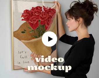 Video Frame Mockup With Person | Vertical Poster Mockup Video | Animated Wall Art Mockup | Hanging Vertical Frame Mockup (PSD + MP4)