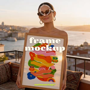 May include: A rectangular wooden frame mockup with a colorful abstract art print. The print features birds, butterflies, and flowers in shades of orange, pink, yellow, and blue. The words "frame mockup" are displayed in large, bold letters.