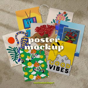 May include: A collection of colorful posters with various designs, including a retro television, a bouquet of roses, and the words "GOOD VIBES." The posters are arranged on a neutral surface, with the words "poster mockup" in the center.