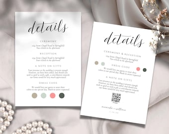 May include: Two white wedding details cards with the word "details" in elegant script. The cards include ceremony and reception information, dress code, and a note on gifts. A pearl necklace and flowers are in the background.